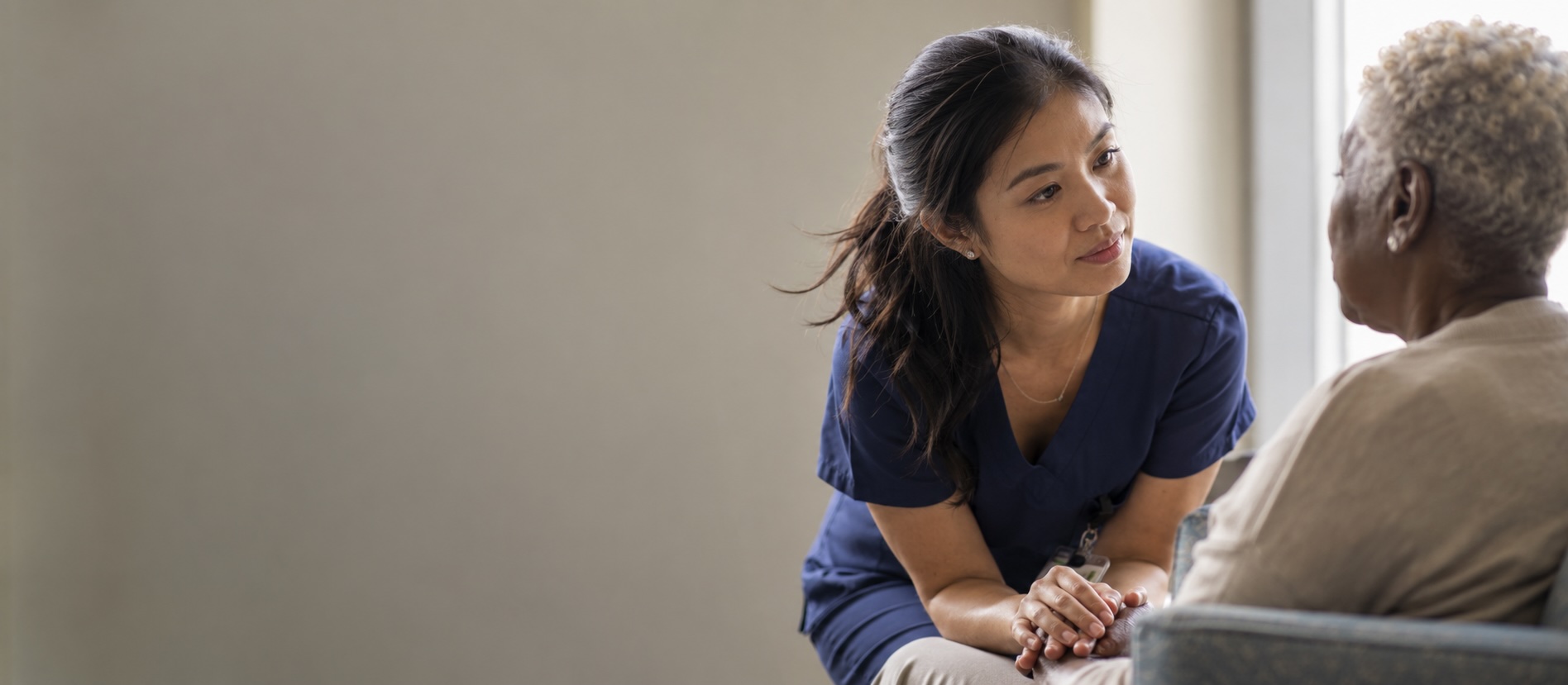 A clinician giving a patient their full attention — the care that Waystar's revenue cycle software works behind the scenes to enable